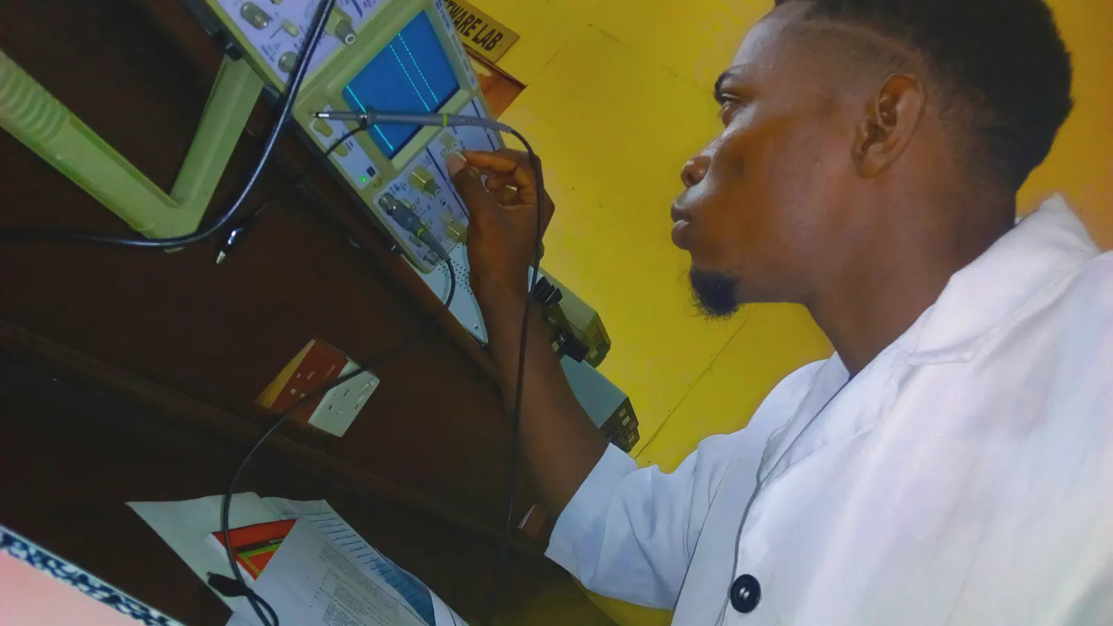 An engineering student working at a laboratory bench